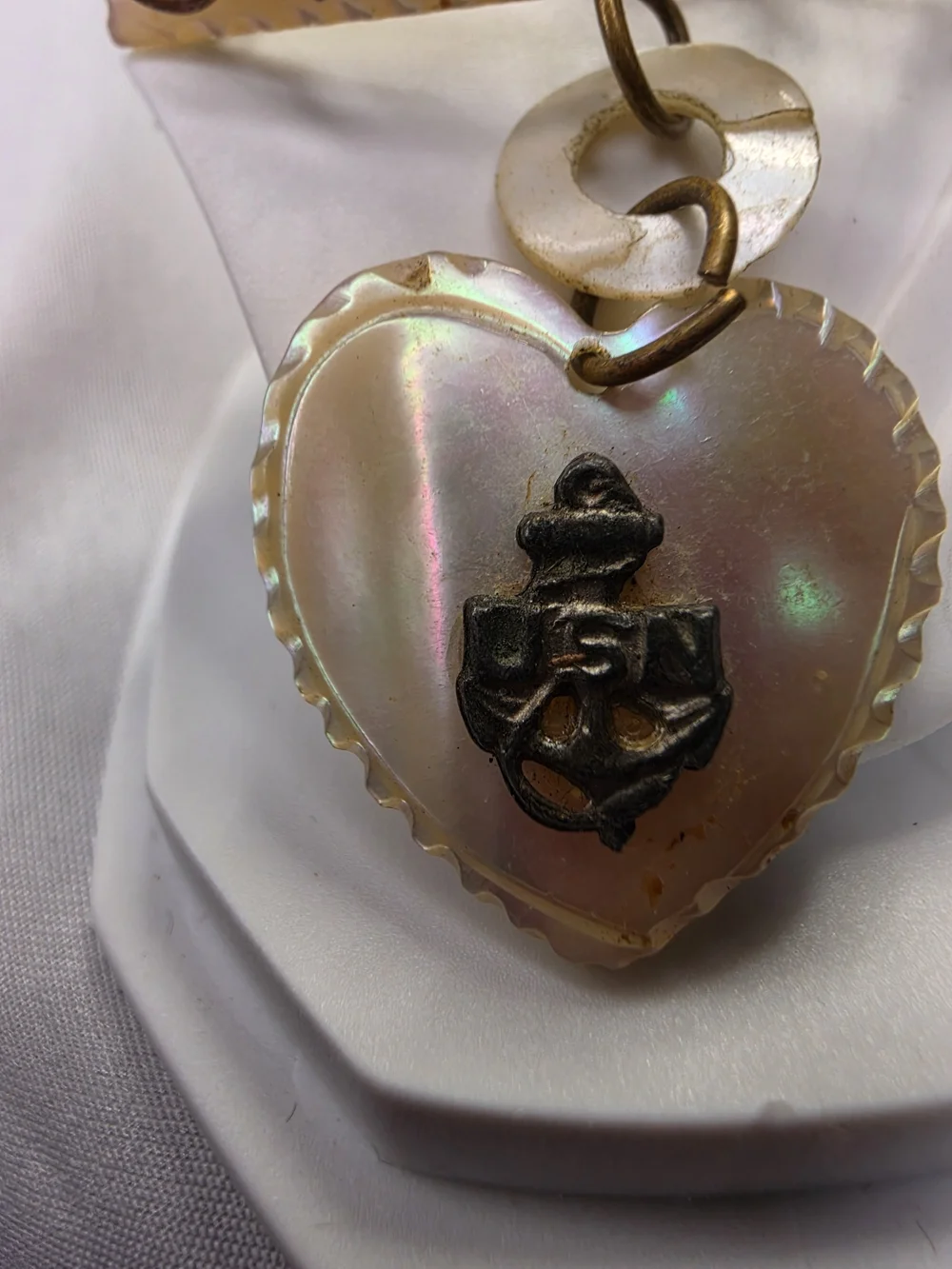 Vintage World War II-era U.S. Navy sweetheart brooch, made from carved MOP